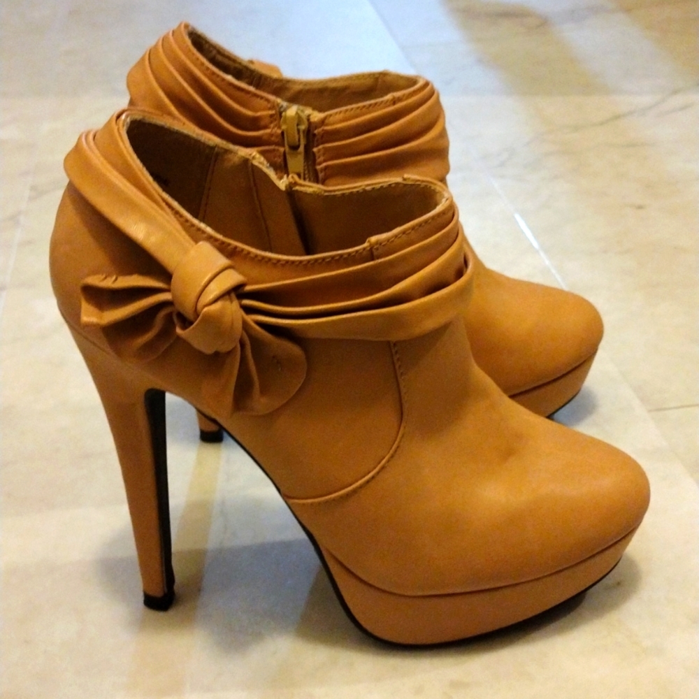 Wild Rose heeled boots.